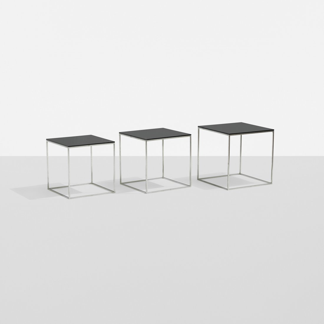 Poul Kjaerholm PK 71 nesting tables, set of three: Poul Kjaerholm PK 71 nesting tables, set of three E. Kold Christensen Denmark, 1957 brushed steel, acrylic 11 w x 11 d x 11 h inches Signed with impressed manufacturer's mark to frame of smallest exam