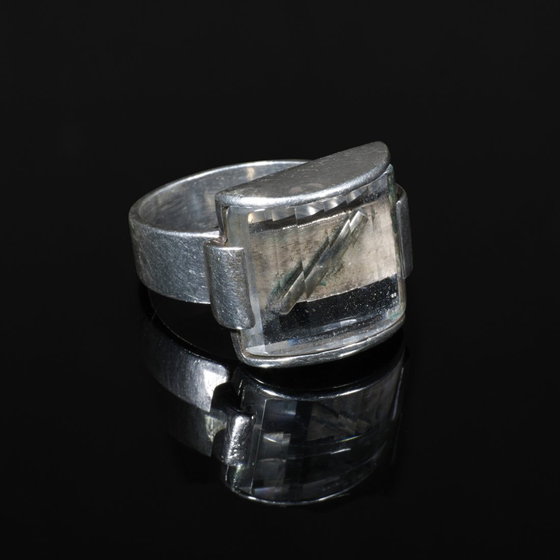 Margaret De Patta ring, model 1: Margaret De Patta ring, model 1 USA, 1942/c. 1950 sterling silver, quartz 1 w x .5 d x 1.25 h inches Impressed signature to interior: [Depatta sterling]. Literature: Space Light Structure: The Jewelry