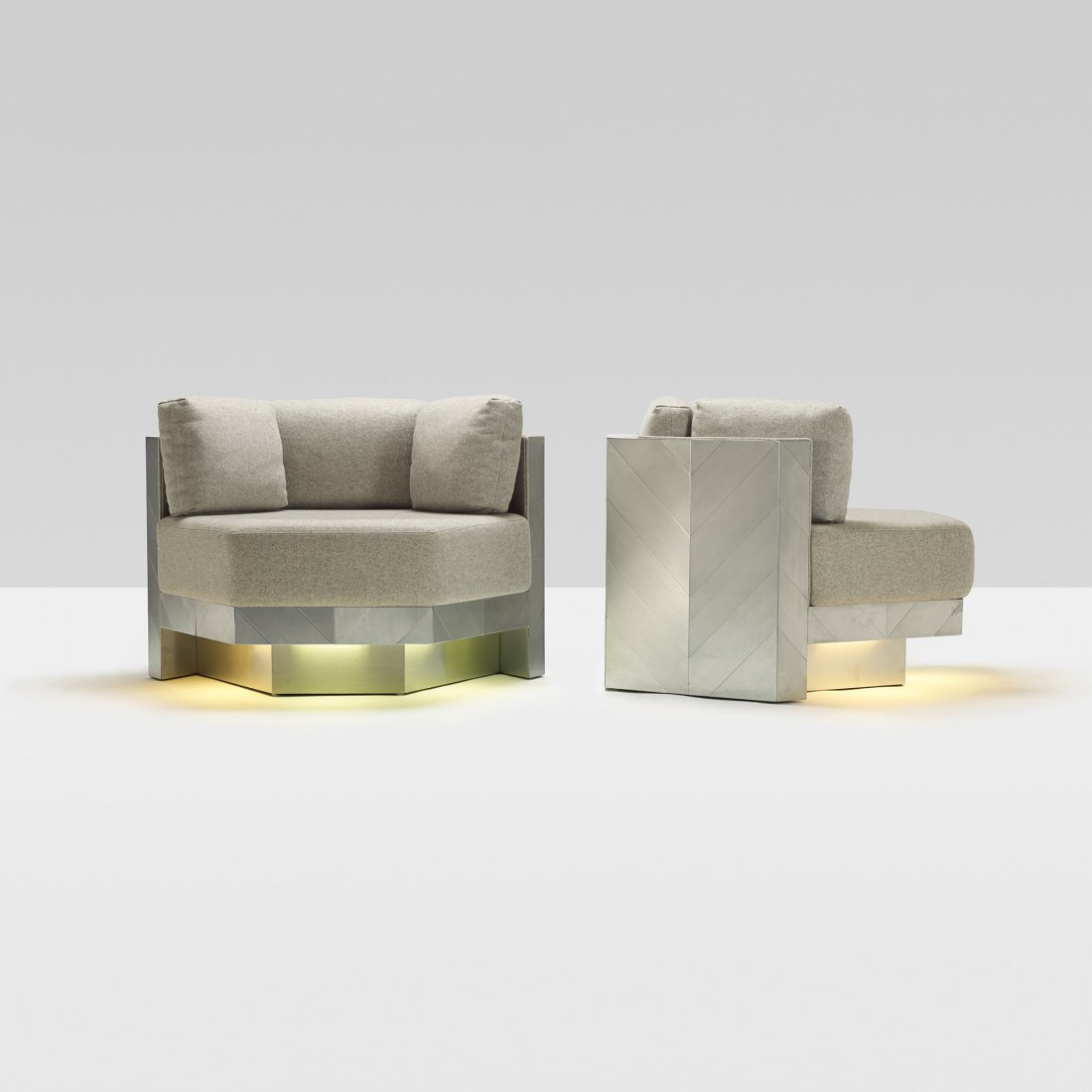 Paul Evans Cityscape lounge chairs, pair: Paul Evans Cityscape lounge chairs, pair Paul Evans Studio for Directional USA, c. 1975 chrome-plated steel, upholstery 39.75 w x 35 d x 27.5 h inches These chairs feature illuminated bases.