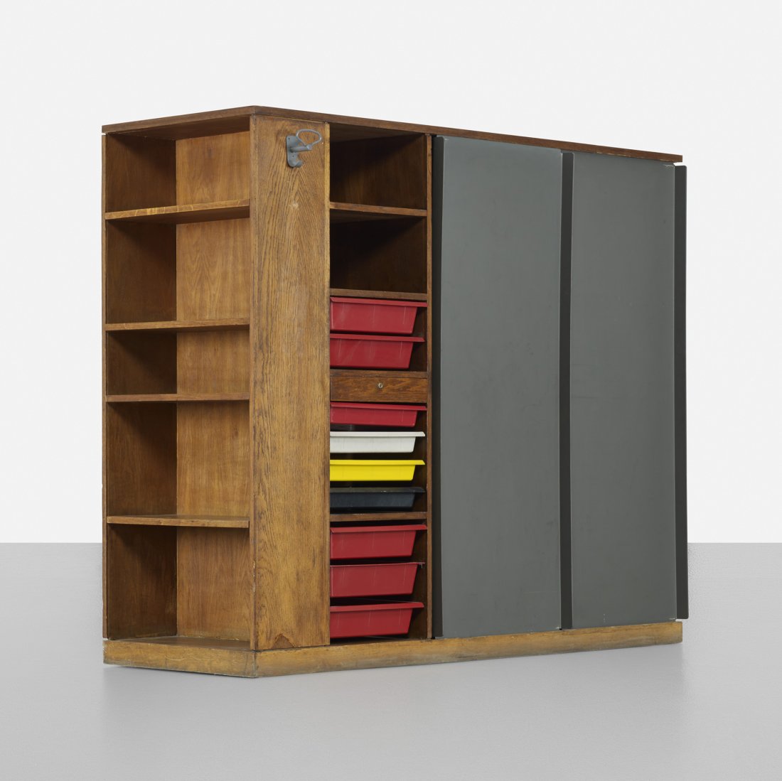 Perriand and Le Corbusier Multipart cabinet: Charlotte Perriand and Le Corbusier Multipart cabinet unit SIBO France, 1955-1959 oak, lacquered wood, plastic, laminate 70.25 w x 28.25 d x 57.25 h inches This multi-part cabinet features nine remova
