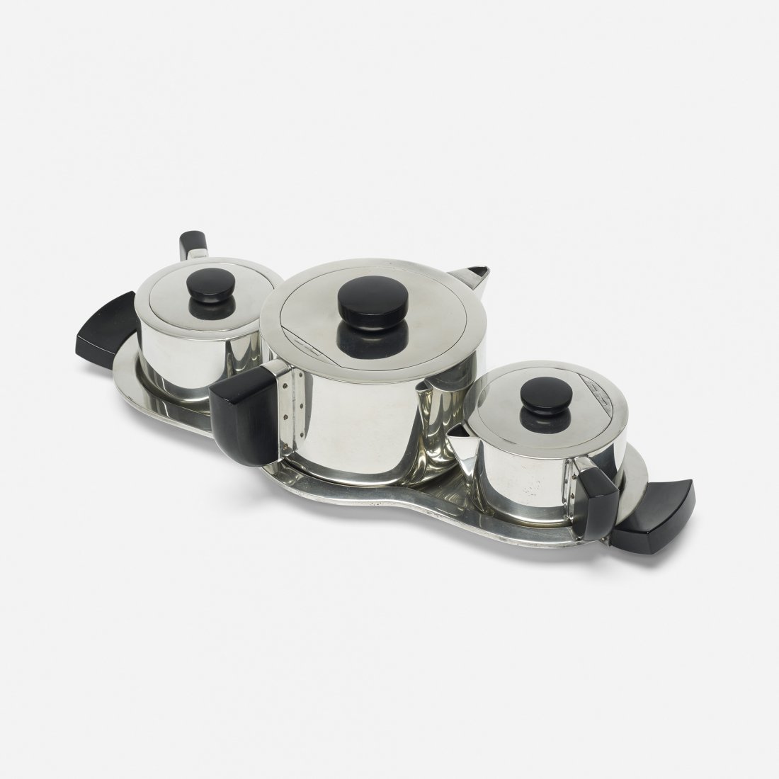 Virginia Hamill teaset: Virginia Hamill teaset Wilcox Silver Plate Company USA, c. 1928 pewter, Bakelite 13.5 w x 7 d x 3.75 h inches Set includes teapot, creamer, sugar bowl and tray. Signed with impressed manufacturer's ma