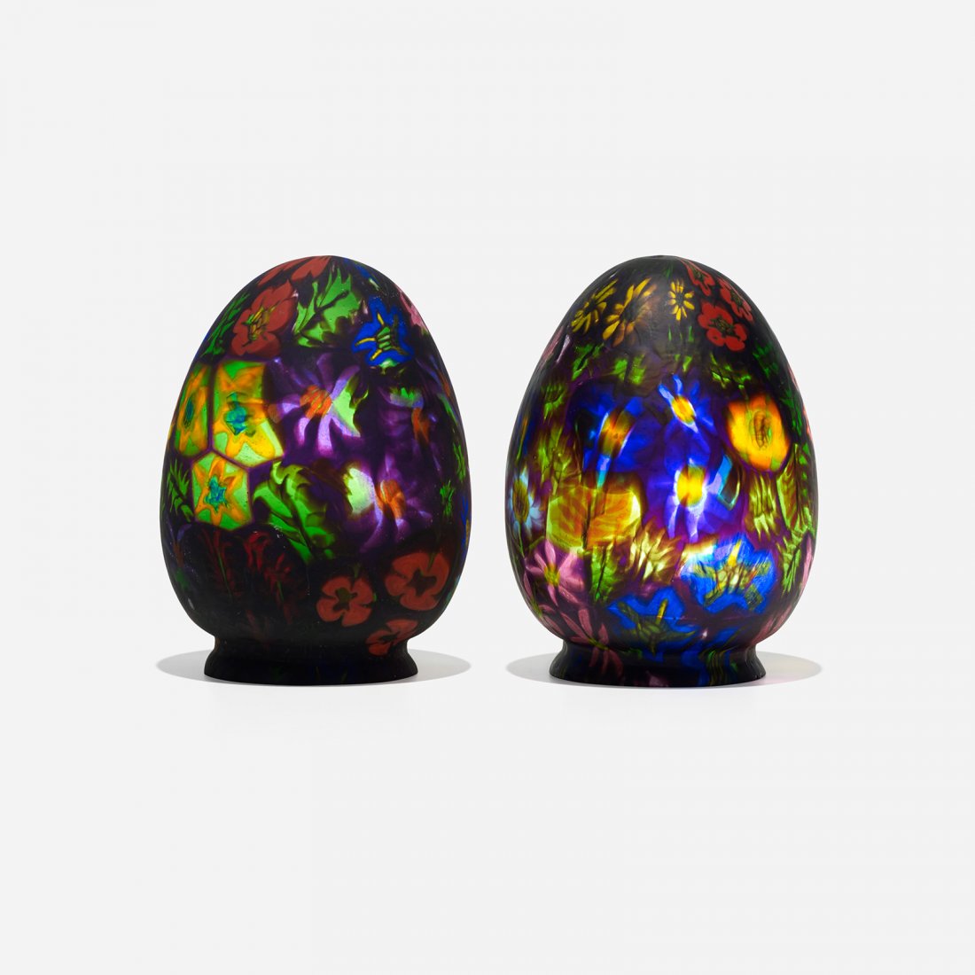 Artisti Barovier shades, pair: Artisti Barovier shades, pair Italy, 1900-1914 black glass with floral murrines 4.25 dia x 6.25 h inches Literature: Venetian Glass: Confections in Glass 1855-1914, Barr, pg. 121