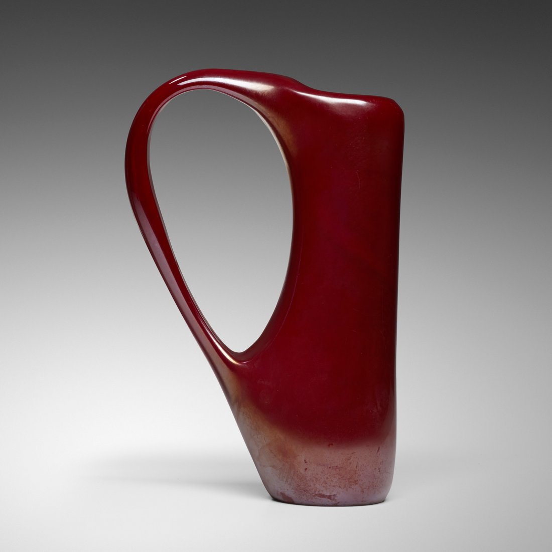 Giorgio Ferro Anse Volante vase: Giorgio Ferro Anse Volante vase A.V.E.M. Italy, 1950 iridized glass 7 w x 3 d x 10.75 h inches Literature: Murano Glas 1945-1970, Heiremans, figs. 3-5 illustrate related works