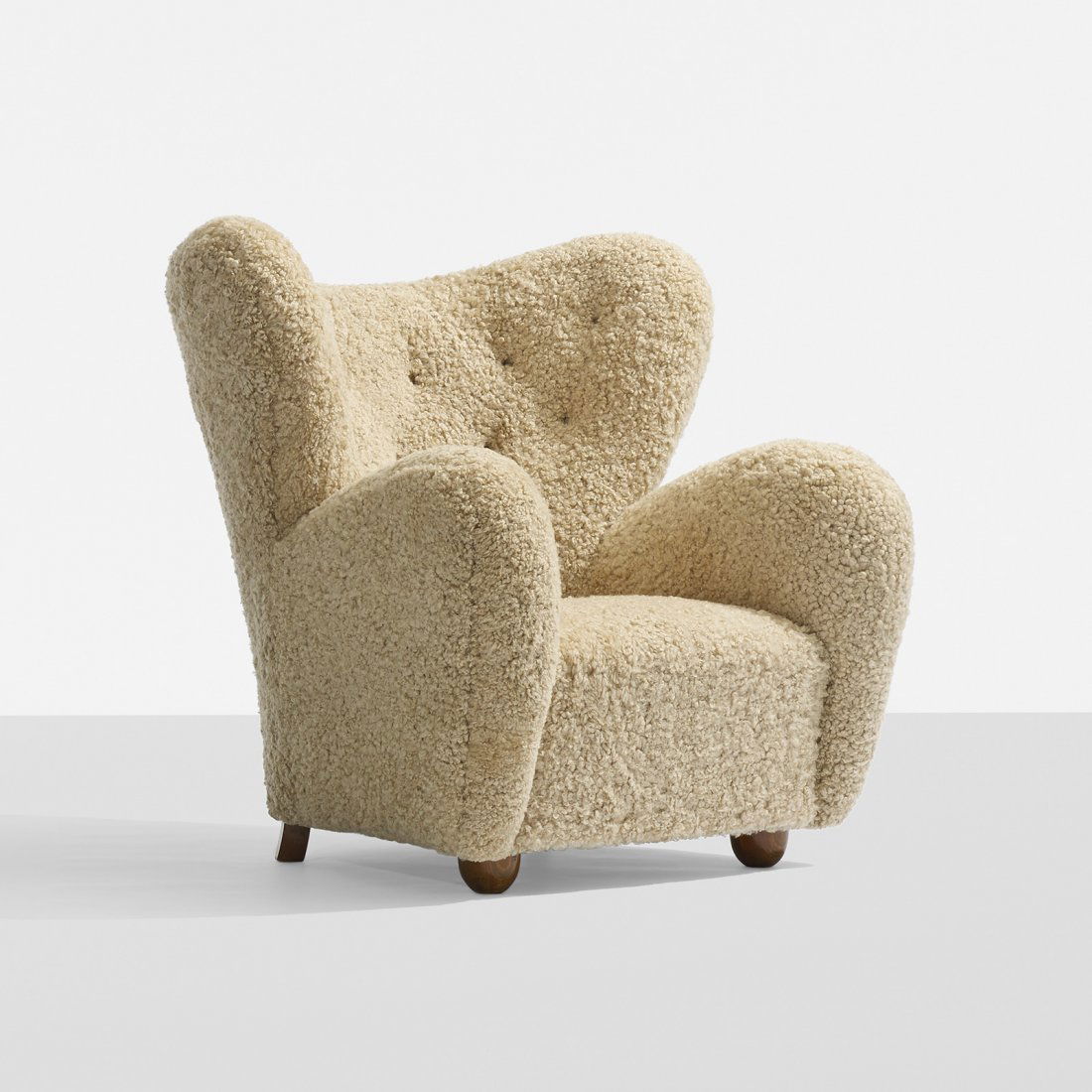 Flemming Lassen, attribution lounge chair: Flemming Lassen, attribution lounge chair Denmark, c. 1940 sheepskin, stained beech 37.5 w x 38 d x 38 h inches