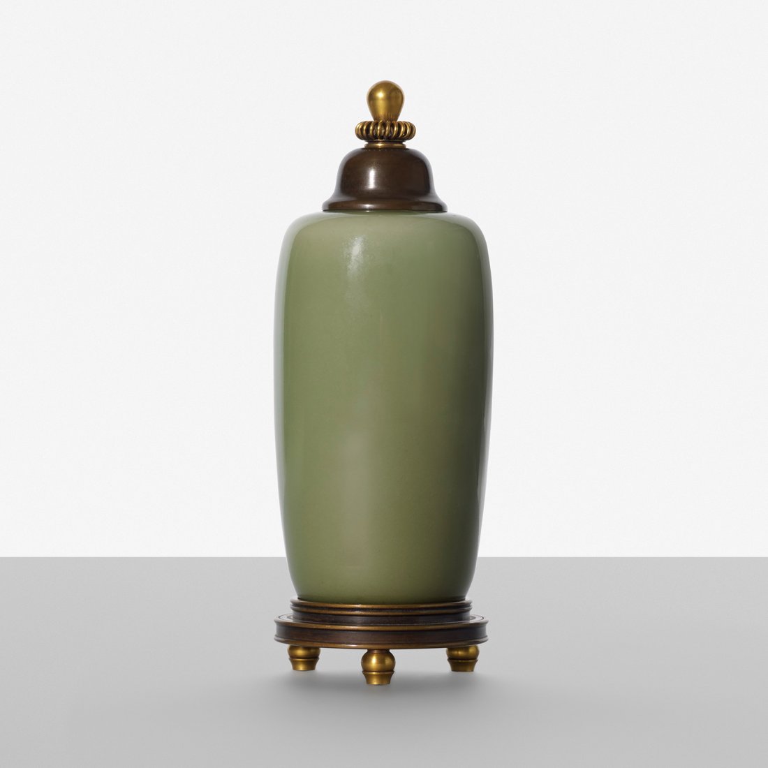 Patrick Nordstrom lidded vessel: Patrick Nordstrom lidded vessel Royal Copenhagen Denmark, 1957 glazed stoneware, bronze, brass 3.25 dia x 8.75 h inches The bronze elements on this work were made by Knud Andersen. Signed with impress