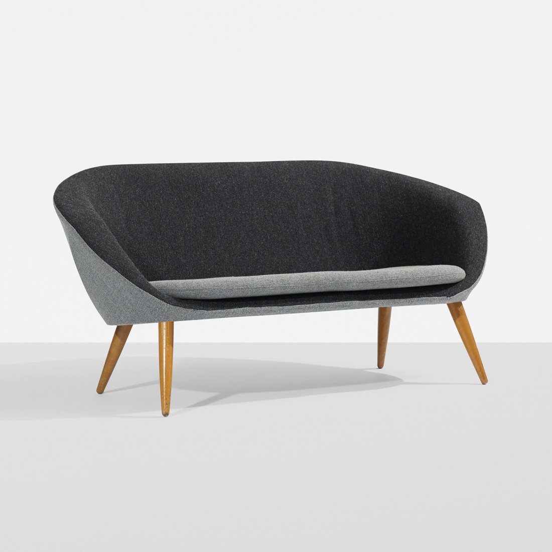 Folke Jansson settee: Folke Jansson settee S.M. Wincrantz USA, c. 1955 upholstery, beech 59 w x 27 d x 27.5 h inches Signed with applied manufacturer's label to underside: [S.M. Wincrantz Skovde].