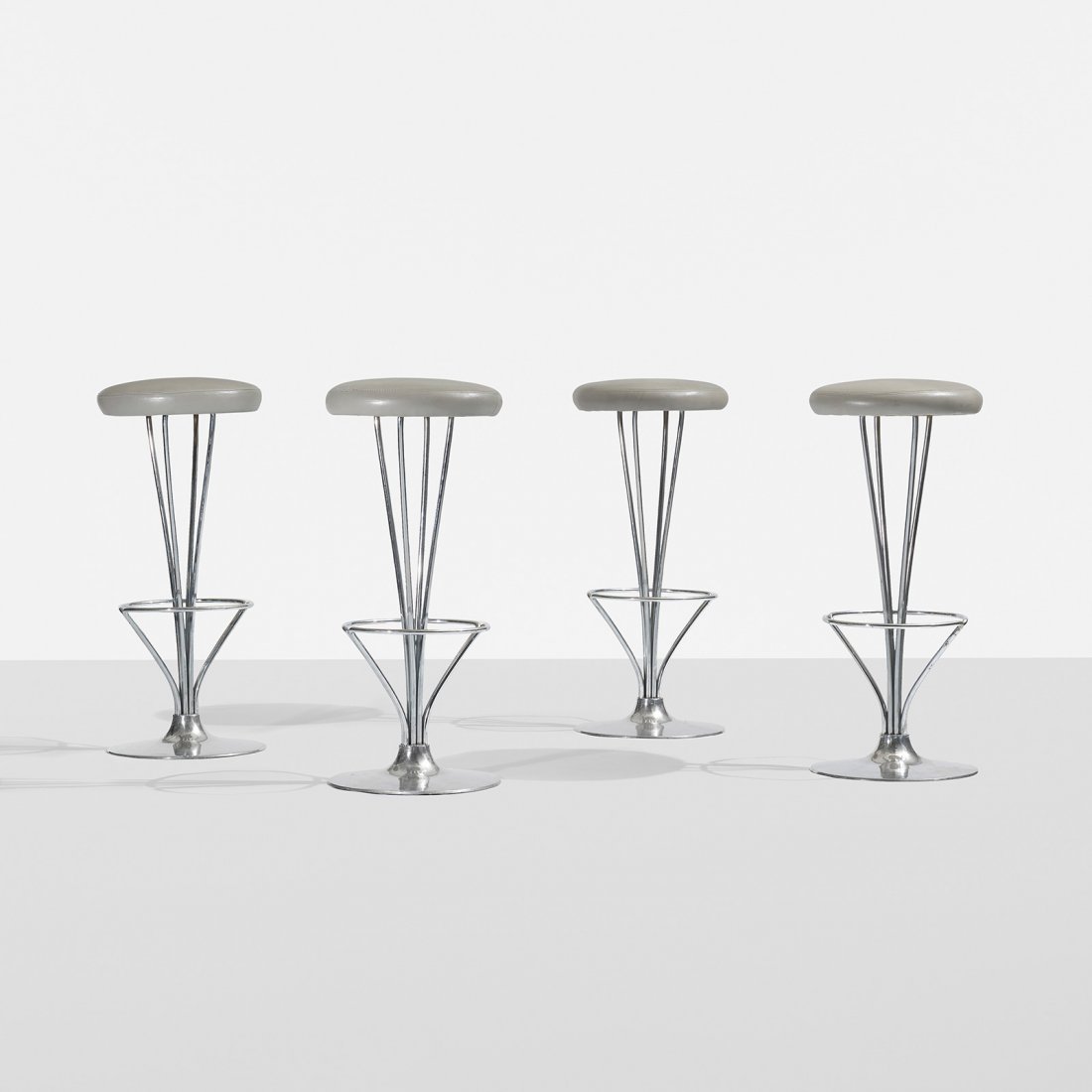 Piet Hein stools, set of four: Piet Hein stools, set of four Fritz Hansen Denmark, 1971/1987 leather, aluminum, matte chrome-plated steel 14 dia x 32 h inches Signed with decal manufacturer's label to underside of each example: [FH