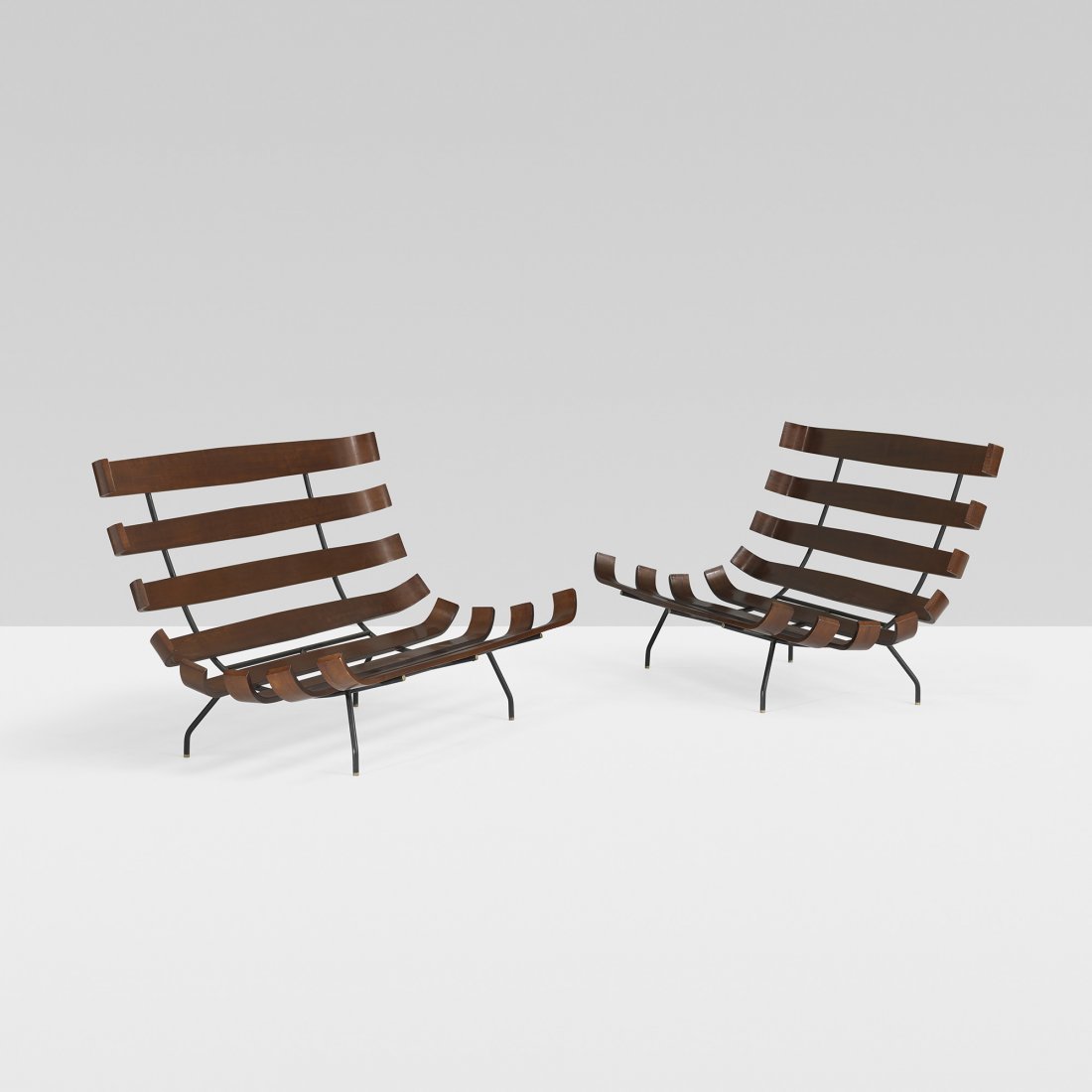 Martin Eisler and Carlo Hauner settees, pair: Martin Eisler and Carlo Hauner settees, pair Forma Italy/Brazil, c. 1955 walnut, enameled steel, upholstery, brass 55 w x 33 d x 32.5 h inches Sold with seat and back cushions (not shown).