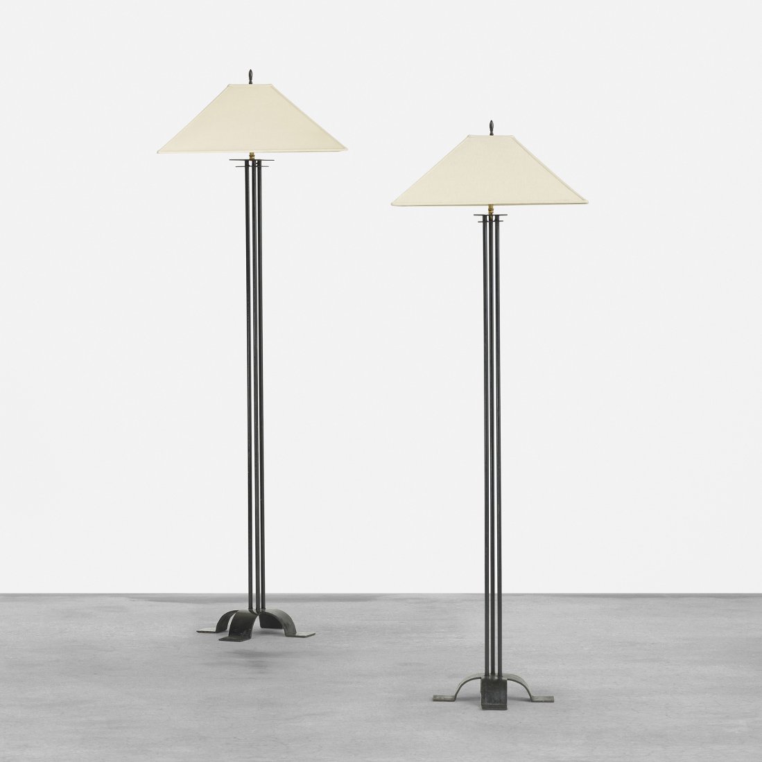 McArthur and Wright pair of floor lamps: Warren McArthur and Frank Lloyd Wright pair of floor lamps from the Arizona Biltmore USA, 1927 enameled iron, brass, lacquered wood, linen 22 w x 22 d x 67.5 h inches Provenance: Arizona Biltmore, Pho