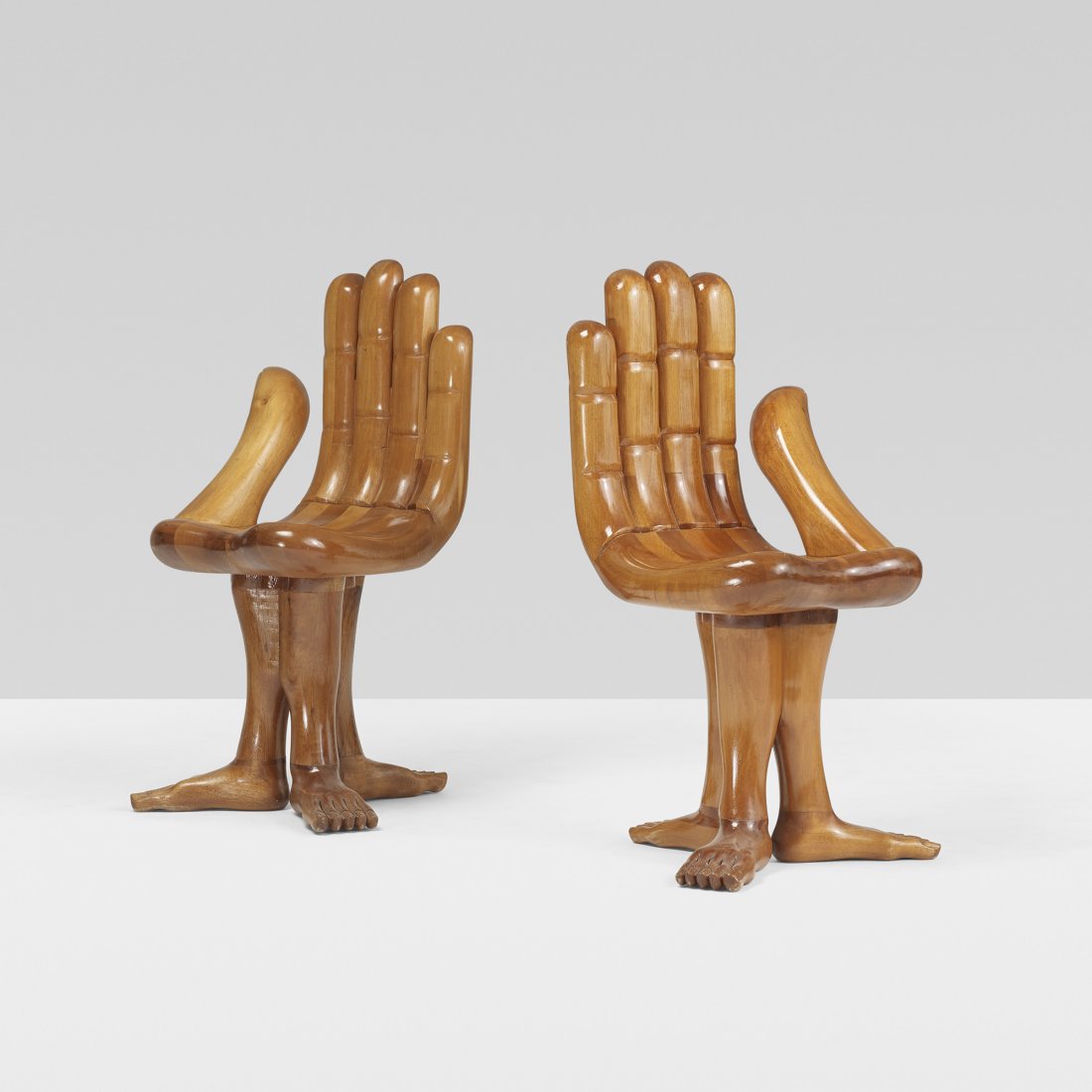 Pedro Friedeberg Hand-Foot chairs, pair: Pedro Friedeberg Hand-Foot chairs, pair Mexico, 2007 carved Mexican walnut 19 w x 21 d x 38 h inches Branded signature to underside of each example: [Pedro Friedeberg] with date to underside of one ex