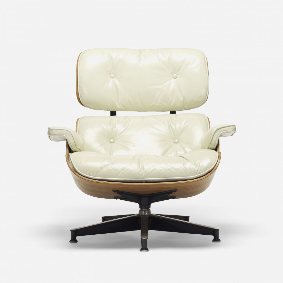 Eames special-order 670 lounge chair: Charles and Ray Eames special-order 670 lounge chair Herman Miller USA, 1956/c. 1965 walnut plywood, leather, enameled aluminum, rubber 33.25 w x 34 d x 32.25 h inches Literature: Eames Design: The Wo