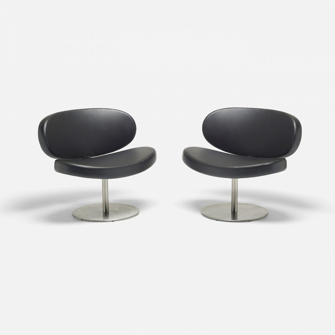 Christophe Pillet Sunset lounge chairs, pair: Christophe Pillet Sunset lounge chairs, pair Cappellini France, 1997 vinyl, stainless steel 32 w x 26 d x 29.5 h inches Signed with decal manufacturer's label to underside of each example: [Cappellini