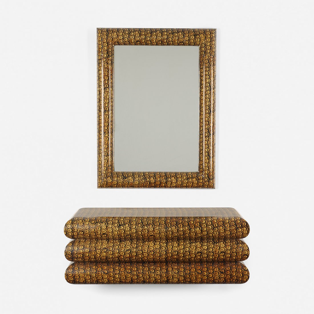 Karl Springer console and mirror: Karl Springer console and mirror Karl Springer, Ltd. USA, c. 1975 lacquered batik dyed fabric over wood, mirrored glass 48 w x 18 d x 18 h inches Mirror measures: 34.25 w x 46 h inches.