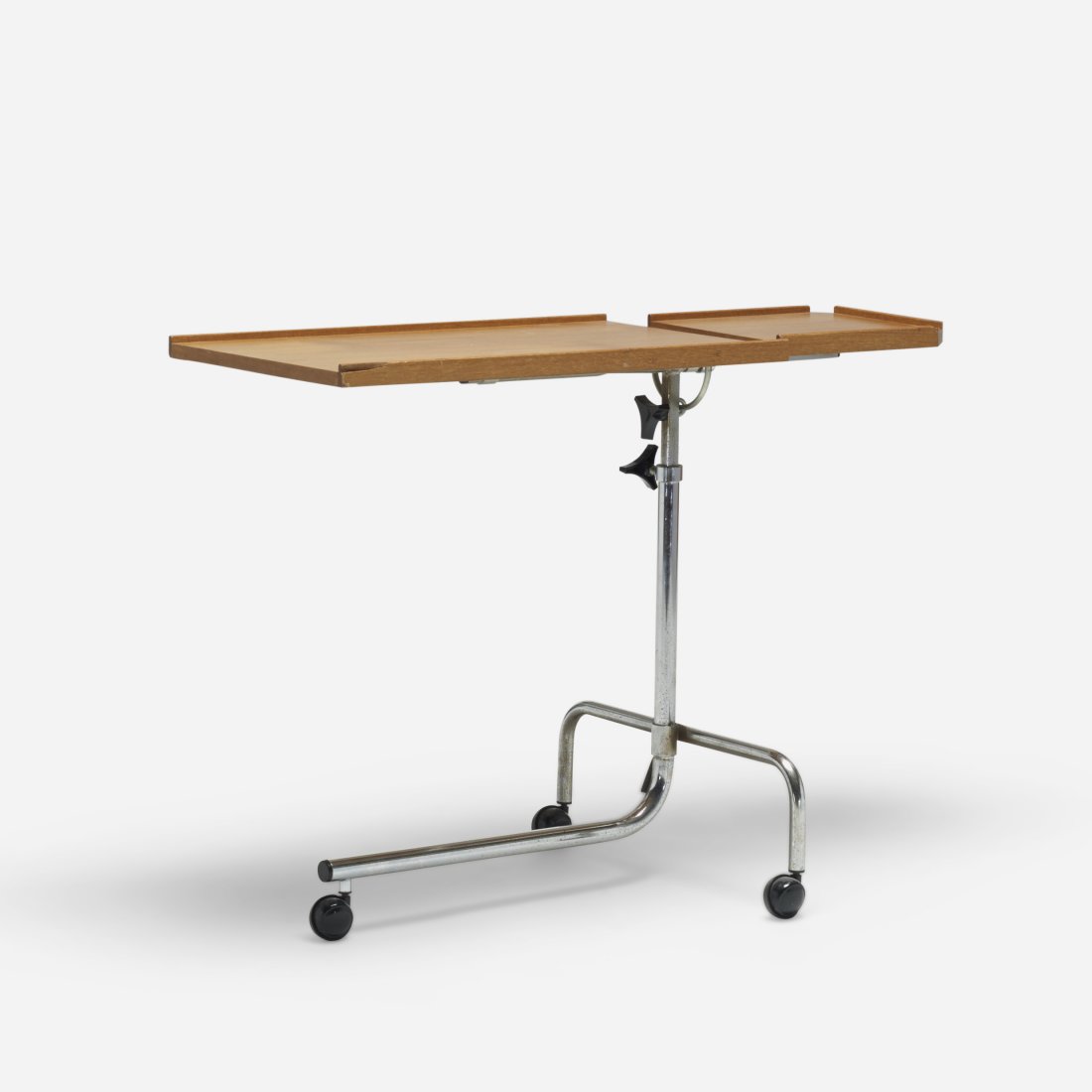 Danish adjustable tray table: Danish adjustable tray table Danecastle -APS teak, chrome-plated steel, plastic 34.25 w x 18 d x 26 h inches Signed with decal manufacturer's label to underside: [Danecastle Aps Made in Denmark].