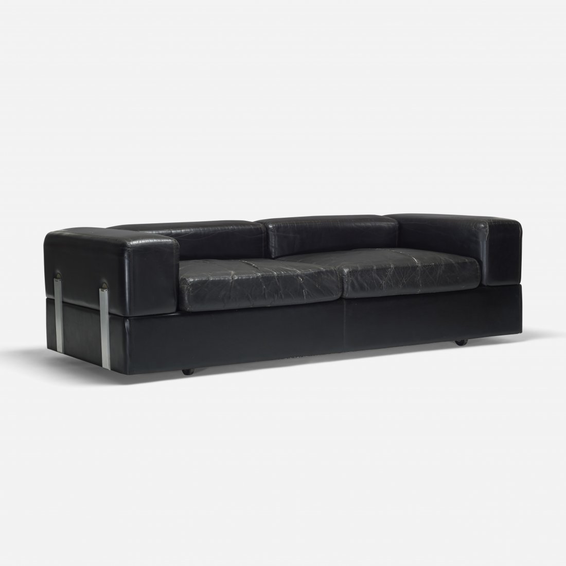 Tito Agnoli sofa: Tito Agnoli sofa Stendig Italy, c. 1968 leather, aluminum, chrome-plated brass 79 w x 35 d x 23 h inches This sofa converts into a guest bed.