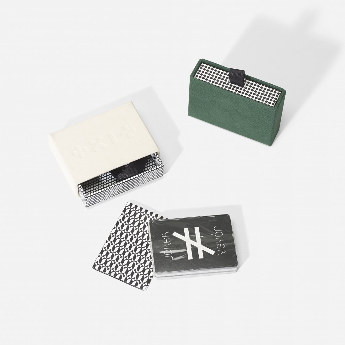 Tauba Auerbach Decks of Playing Cards: Tauba Auerbach two decks from the One Deck of Playing Cards series USA, 2009 offset print on paper, canvas 3 w x 1.25 d x 4 h inches Signed, titled, and numbered to white deck 'One Deck of Cards by Ta