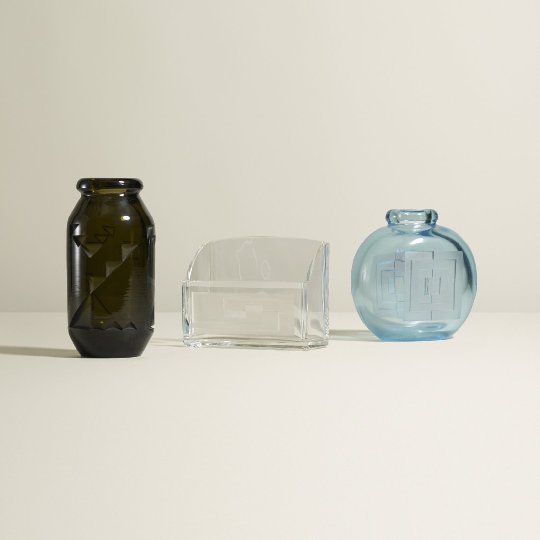 Jean Luce collection of three vessels: Jean Luce collection of three vessels France, c. 1930 glass, cut glass 3.75 dia x 7.5 h inches Lot includes two vases and one letter holder. Signed with acid stamp to underside of each example: [JL].