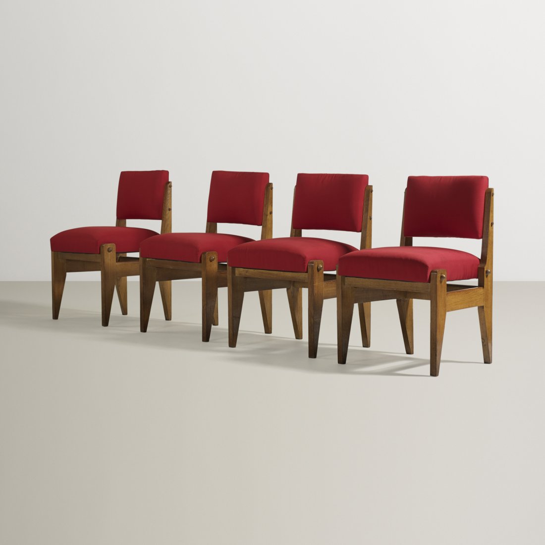 Robert Guillerme and Jacques Chambron dining chairs: Robert Guillerme and Jacques Chambron dining chairs, set of four France, c. 1950 stained oak, upholstery 22 w x 20 d x 31.5 h inches