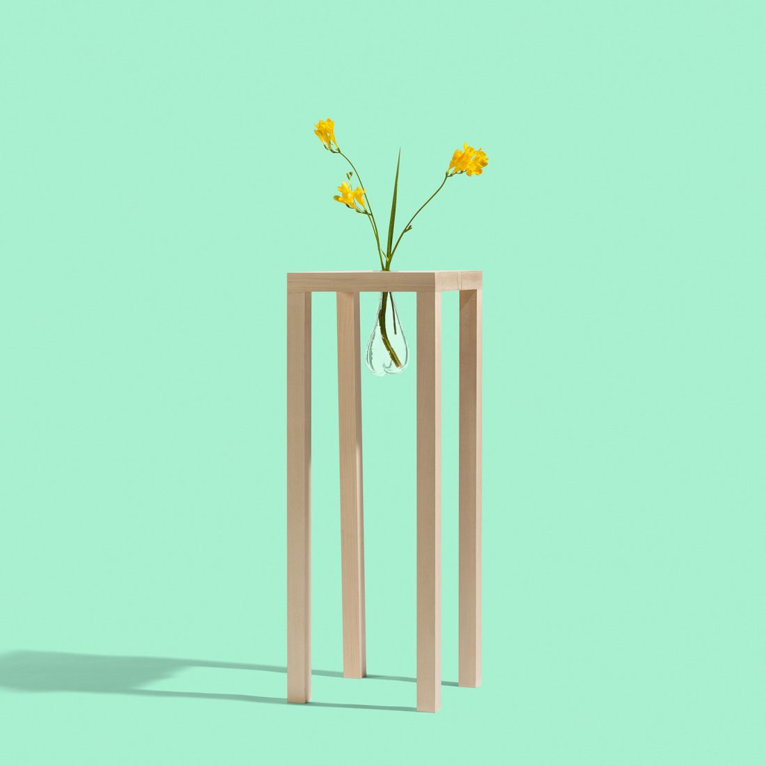 Lawrence Laske console with suspended vase: Lawrence Laske console with suspended vase Whitermore USA, 1991/2014 beech, hand-blown glass 11 w x 11 d x 30.5 h inches Branded signature to underside: [Laske Whitermore 2014].