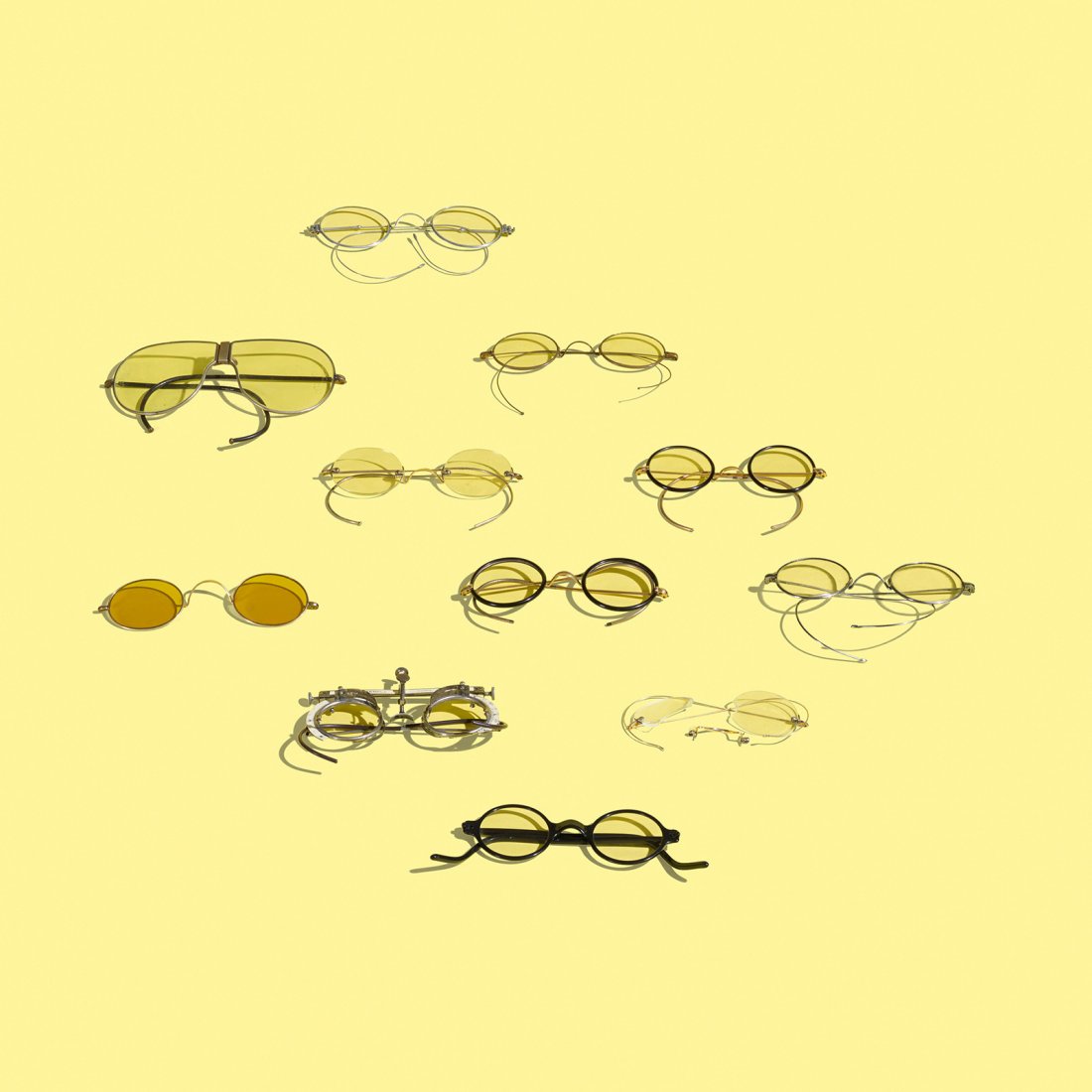 Anonymous collection of eleven eyeglasses: Anonymous collection of eleven eyeglasses c. 1915 glass, brass, aluminum, steel, enamel 5 w x 3.5 d x 2 h inches Provenance: Collection of Lawrence Laske