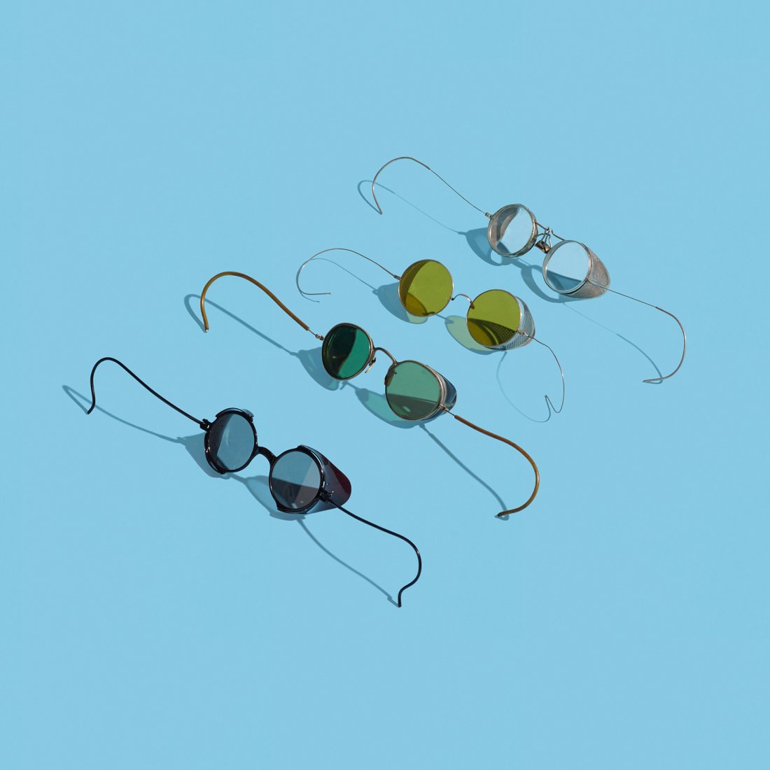 Anonymous collection of four safety glasses: Anonymous collection of four safety glasses c. 1915 nickel-plated brass, glass, aluminum, celluloid 5.5 w x 5.5 d x 2 h inches Provenance: Collection of Lawrence Laske