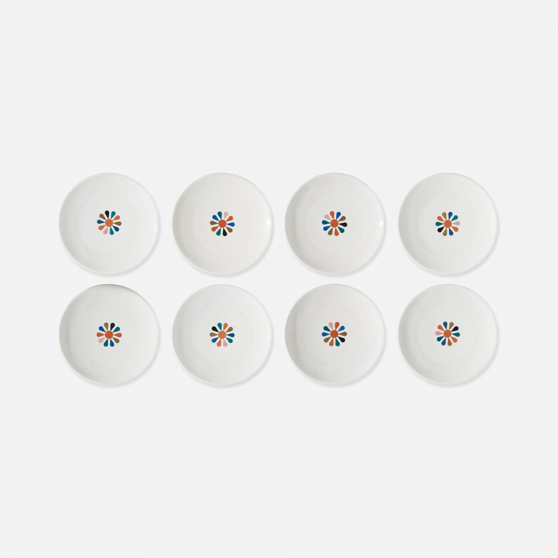 Alexander Girard Carolus Magnus plates, set of eight: Alexander Girard Carolus Magnus plates, set of eight Hutschenreuther for Georg Jensen USA, c. 1956 glazed porcelain with applied decoration 10.75 dia x 1.25 h inches Signed with stamped manufacturer's