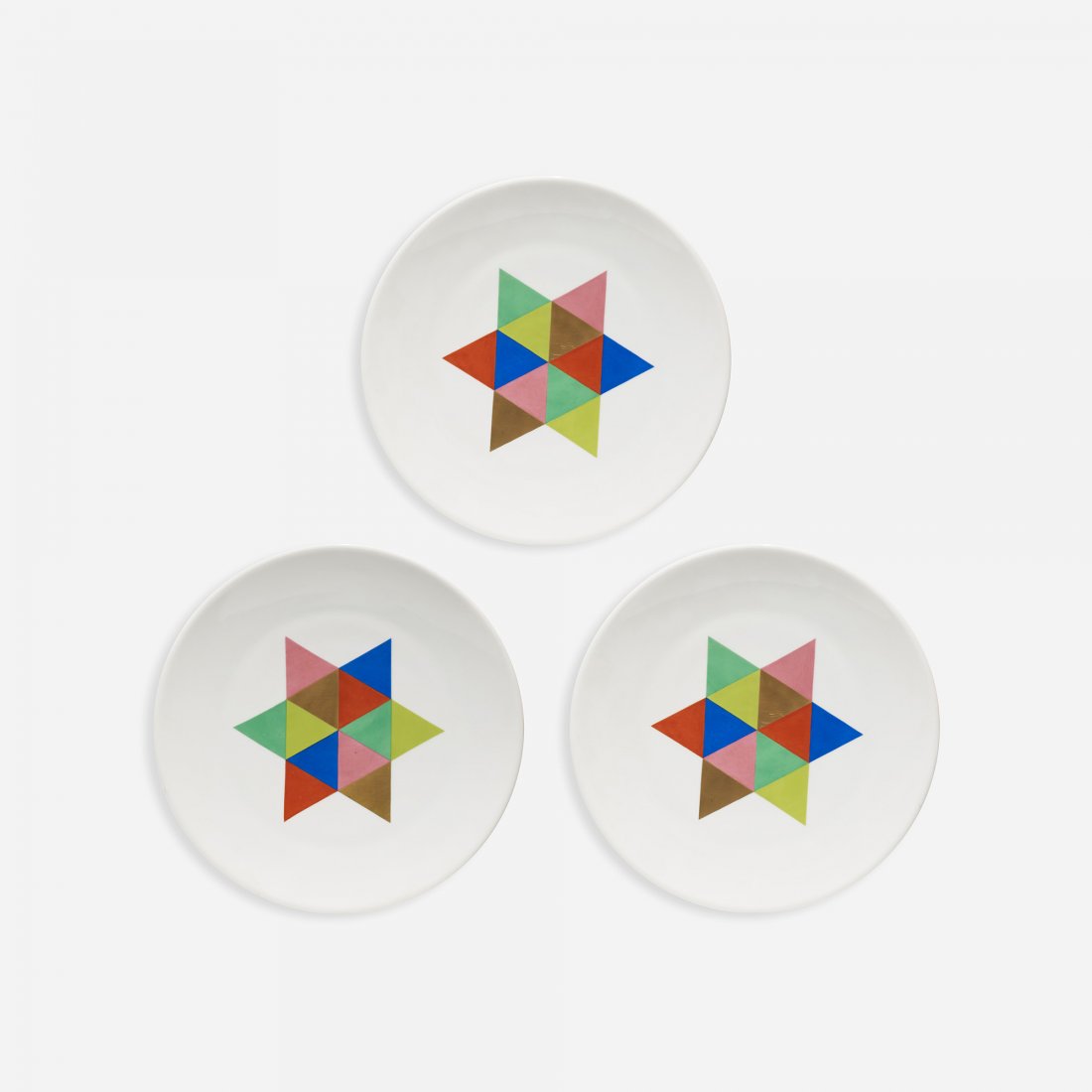 Alexander Girard Carolus Magnus plates, set of three: Alexander Girard Carolus Magnus plates, set of three Hutschenreuther for Georg Jensen USA, c. 1956 glazed porcelain with applied decoration 12.75 dia x 1.25 h inches Signed with stamped manufacturer's