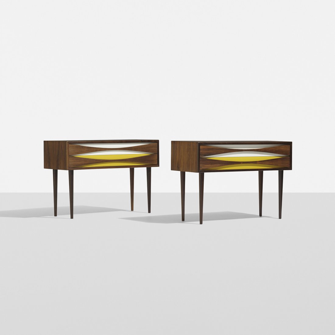 Arne Vodder nightstands, pair: Arne Vodder nightstands, pair Sibast Furniture Denmark, c. 1960 rosewood, lacquered wood 37.5 w x 12.5 d x 21.25 h inches Each nightstand features two drawers.