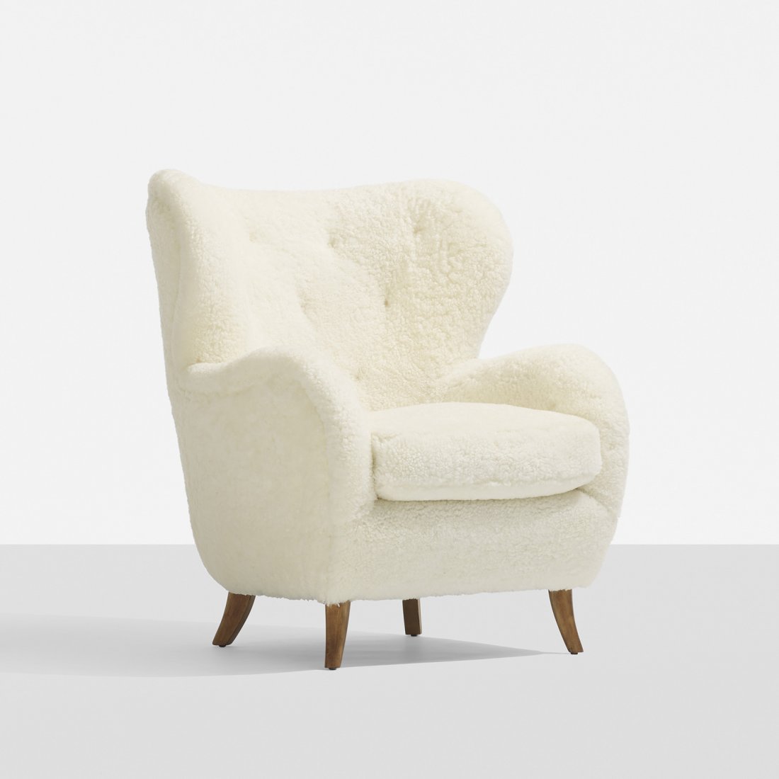 Flemming Lassen, attribution lounge chair: Flemming Lassen, attribution lounge chair Denmark, c. 1950 sheepskin, stained beech 30 w x 35 d x 38 h inches