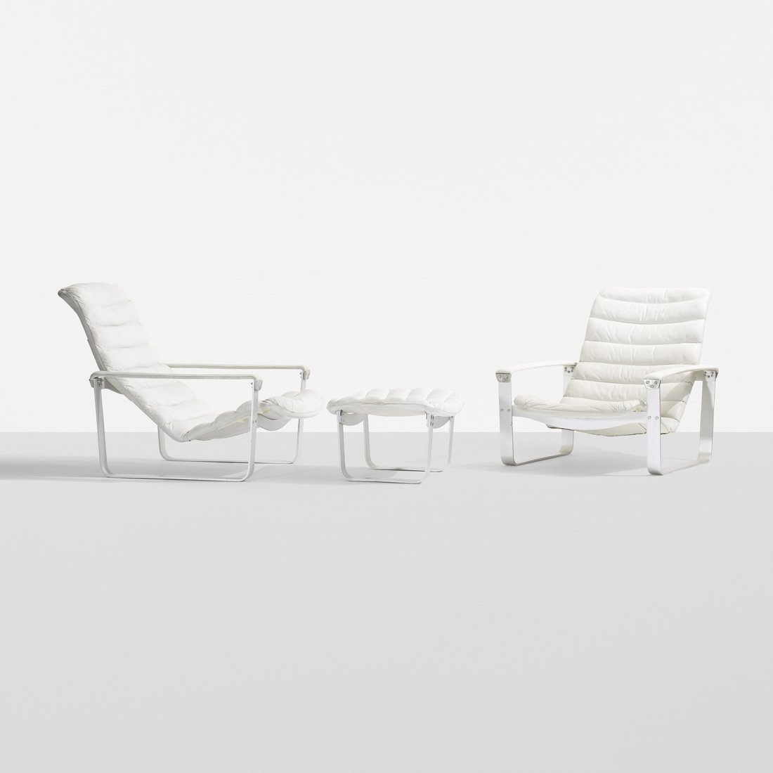 Ilmari Lappalainen pair of Pulkka chairs with ottoman: Ilmari Lappalainen pair of Pulkka lounge chairs with ottoman Asko Oy Finland, c. 1967 leather, aluminum 29 w x 41 d x 33 h inches Ottoman measures: 22 w x 20 d x 13.5 h inches. Signed with applied dec