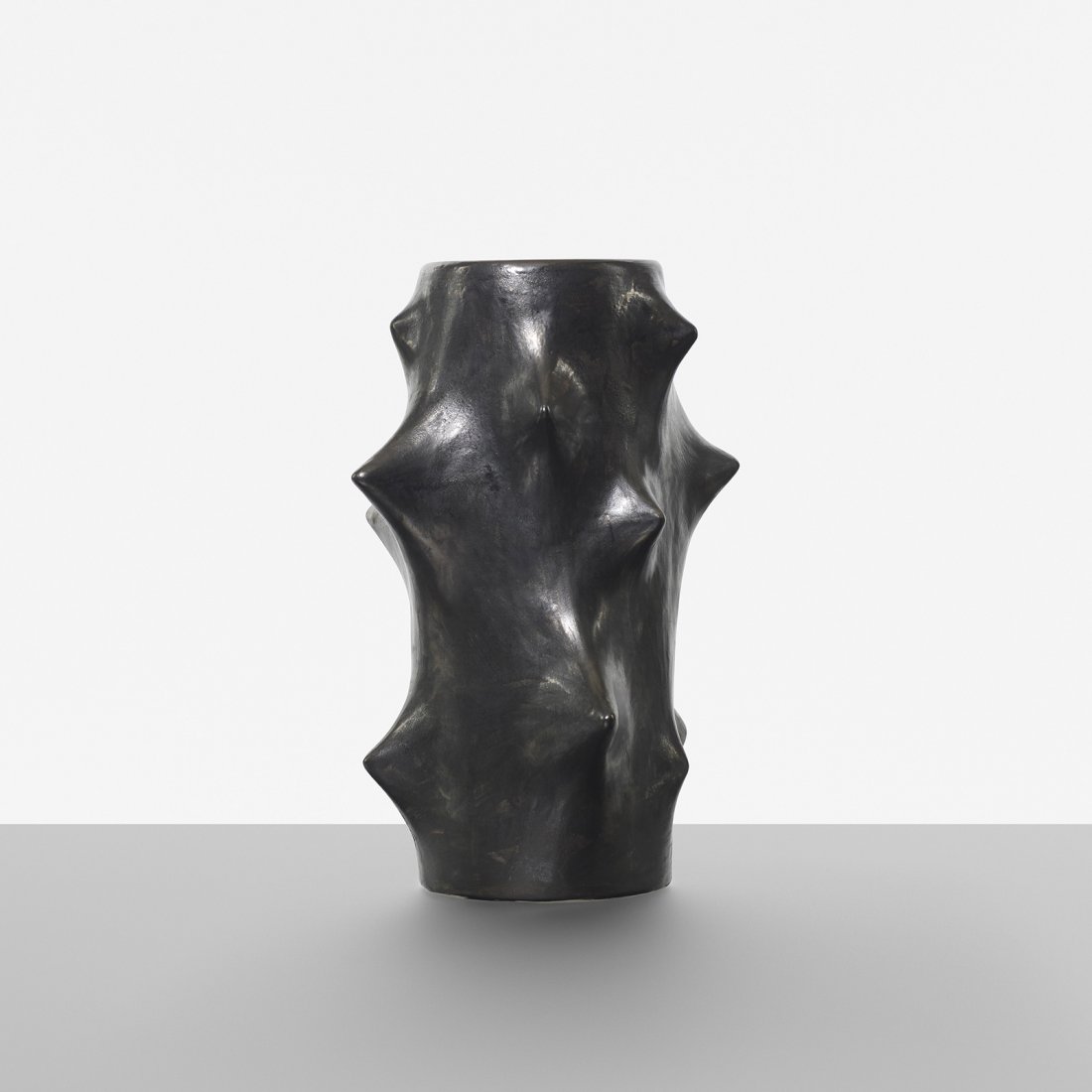 Knud Basse vase: Knud Basse vase Michael Andersen & Son Denmark, c. 1955 glazed stoneware 8 w x 7 d x 10.5 h inches Signed with studio cipher to underside.