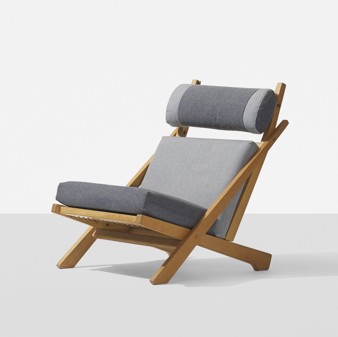 Hans Wegner lounge chair: Hans Wegner lounge chair Getama Denmark, 1967 beech, upholstery, brass 26.75 w x 36 d x 35.5 h inches Literature: Hans J. Wegner's 100 Chairs, Oda, pg. 113