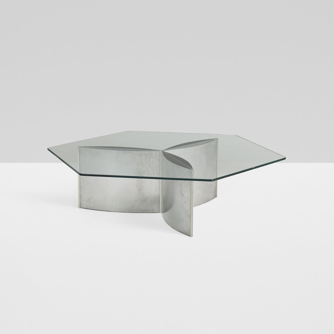 Kim Moltzer and Jean-Paul Barray coffee table: Kim Moltzer and Jean-Paul Barray coffee table France, c. 1965 stainless steel, aluminum, glass 45 w x 39.25 d x 12.25 h inches Literature: Furniture and Interiors of the 1970s, Bony, pg. 103 Les Déco