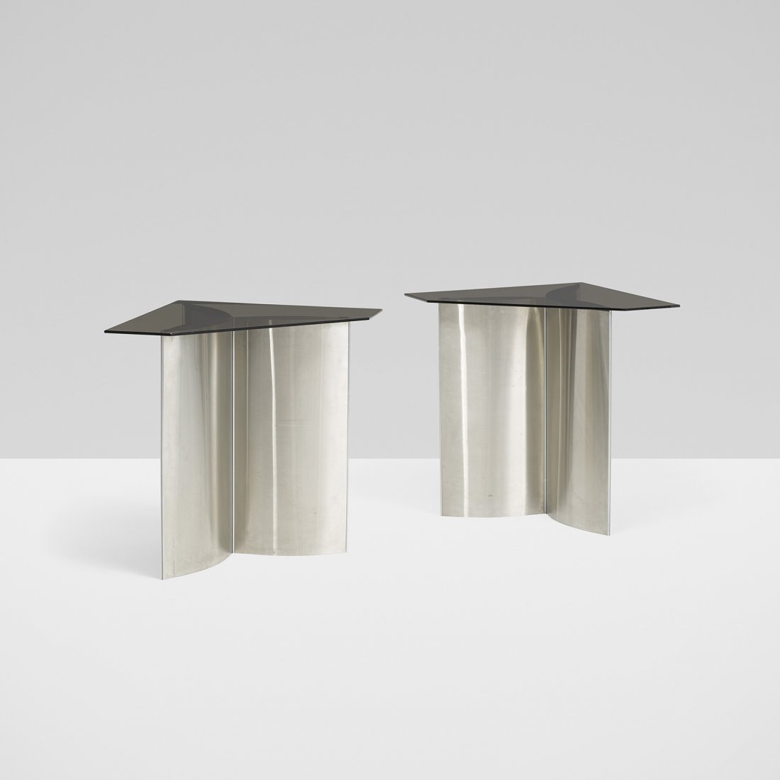 Kim Moltzer and Jean-Paul Barray consoles, pair: Kim Moltzer and Jean-Paul Barray consoles, pair France, c. 1970 stainless steel, aluminum, smoked glass 42.5 w x 27.75 d x 33.25 h inches Literature: Les Décorateurs des années 60-70, Favardin, pg.