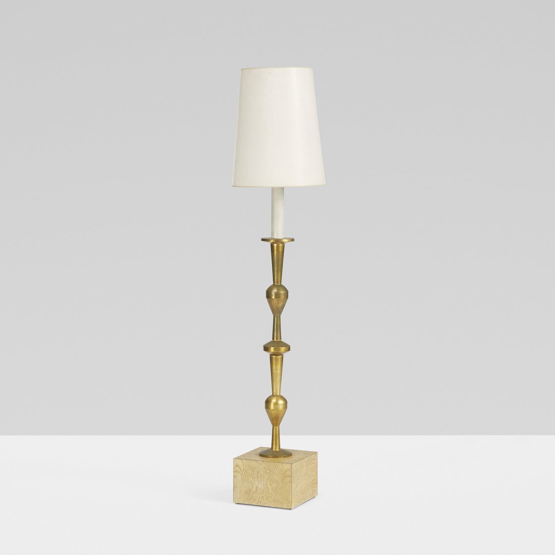 Tommi Parzinger floor lamp: Tommi Parzinger floor lamp Parzinger Originals USA, c. 1955 gilt wood, elm, enameled aluminum, parchment 4.5 dia x 67 h inches Provenance: Jean and Roger Grossman, Chappaqua, NY