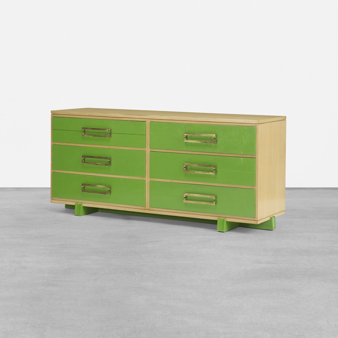 Tommi Parzinger cabinet: Tommi Parzinger cabinet Parzinger Originals USA, c. 1955 beech, lacquered wood, brass 72 w x 22 d x 32.25 h inches Cabinet features six drawers and drop-front door concealing pull-out vanity, storage