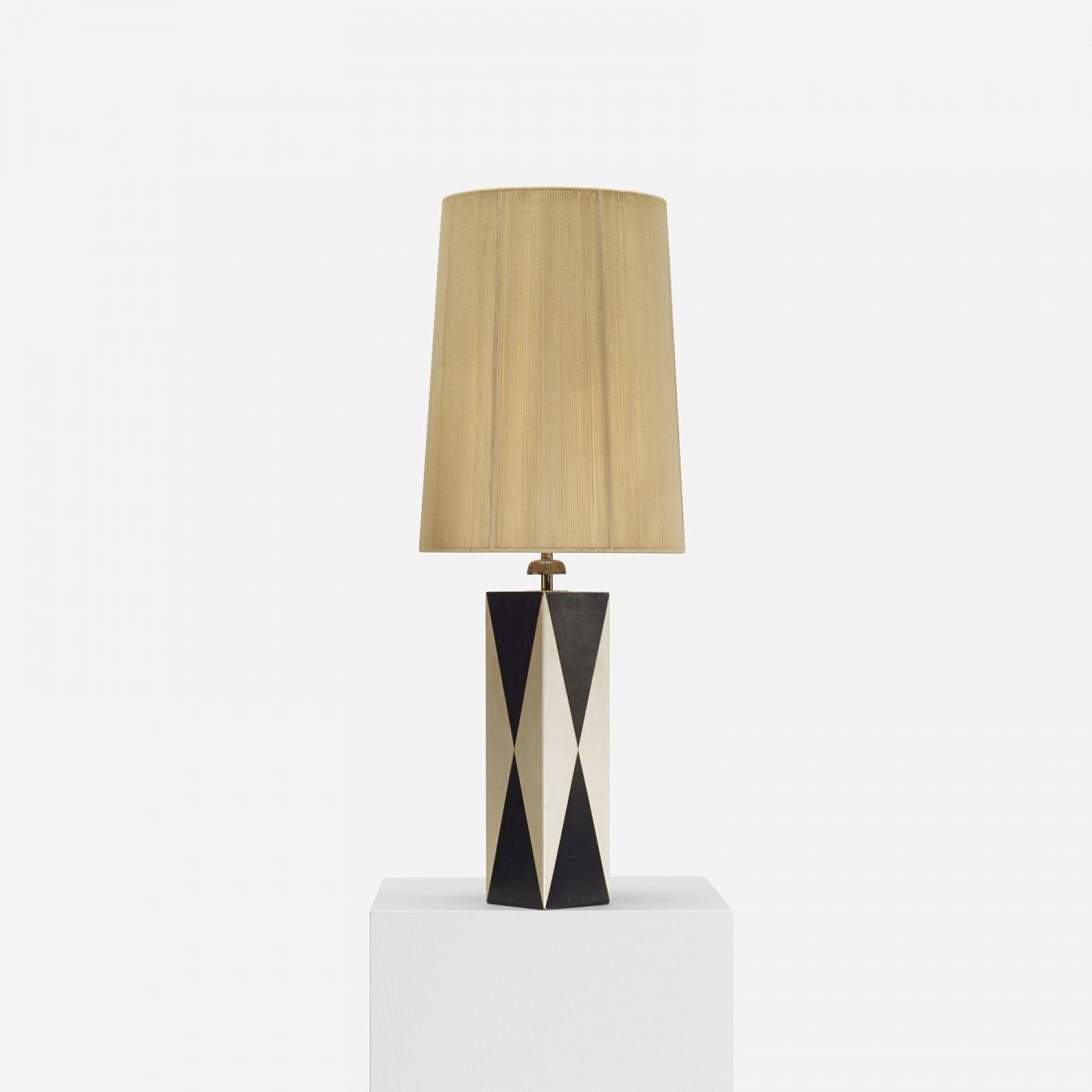 Tommi Parzinger table lamp: Tommi Parzinger table lamp Parzinger Originals USA, c. 1955 leather over wood, string, brass 12.25 dia x 31.75 h inches Provenance: Jean and Roger Grossman, Chappaqua, NY