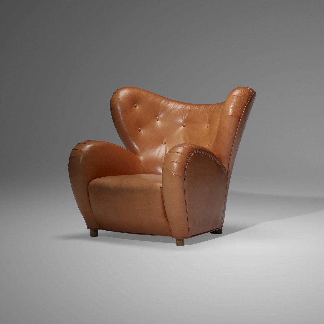 Flemming Lassen Den Trætte Mand lounge chair: Flemming Lassen Den Trætte Mand (The Tired Man) lounge chair A.J. Iversen Snedkermester Denmark, c. 1935 leather, oak 39 w x 36 d x 34 h inches Literature: Dansk Møbelkunst gennem 40 aar, Vol. 1, Ja