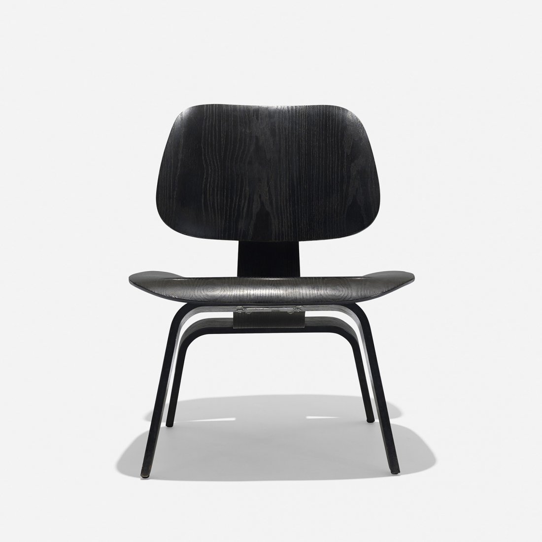Charles and Ray Eames LCW: Charles and Ray Eames LCW Herman Miller USA, 1945 aniline-dyed ash plywood, rubber 22 w x 24 d x 27 h inches Signed with applied foil manufacturer's label to underside: [Charles Eames Design Herman Mi
