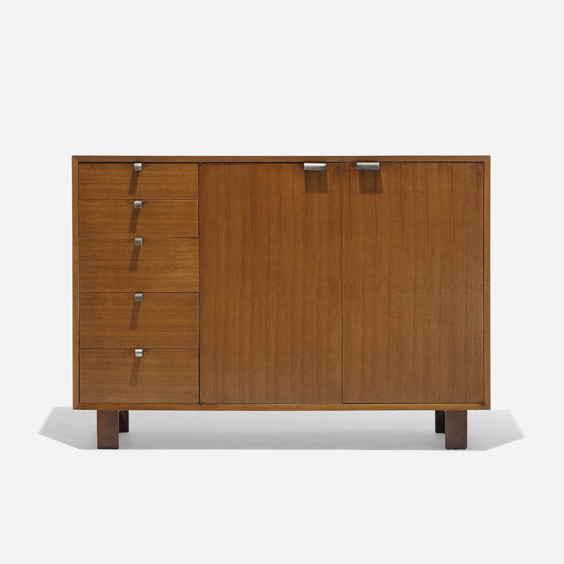 George Nelson & Associates cabinet, model 4937: George Nelson & Associates cabinet, model 4937 Herman Miller USA, 1946 walnut, aluminum 26.25 w x 19.5 d x 39.75 h inches Cabinet features five drawers and two doors concealing storage. Literature: Ge