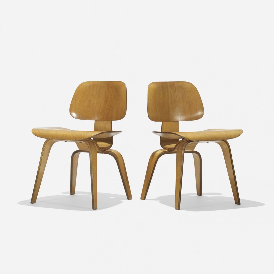 Charles and Ray Eames DCWs, pair: Charles and Ray Eames DCWs, pair Herman Miller USA, 1945 birch plywood, rubber 19.25 w x 22 d x 29 h inches Literature: Eames Design: The Work of the Office of Charles and Ray Eames, Neuhart, Neuhart 