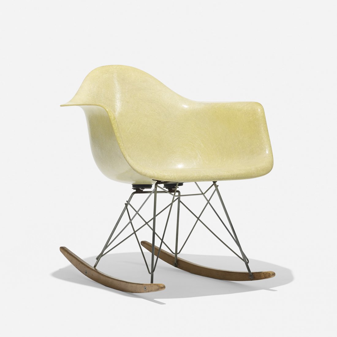 Charles and Ray Eames RAR: Charles and Ray Eames RAR Herman Miller/Zenith Plastics USA, 1950 molded fiberglass with rope edge, beech, zinc-plated steel 24.75 w x 24.5 d x 27 h inches Signed with applied manufacturer's label to