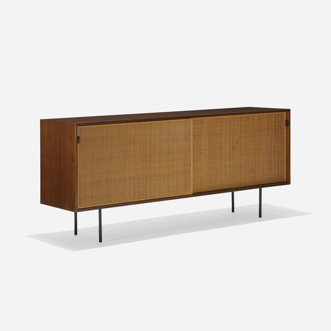 Florence Knoll cabinet, model 116: Florence Knoll cabinet, model 116 Knoll Associates USA, 1948 walnut, caning, enameled steel, leather 72 w x 18.5 d x 31 h inches Cabinet features two doors concealing four compartments with adjustable