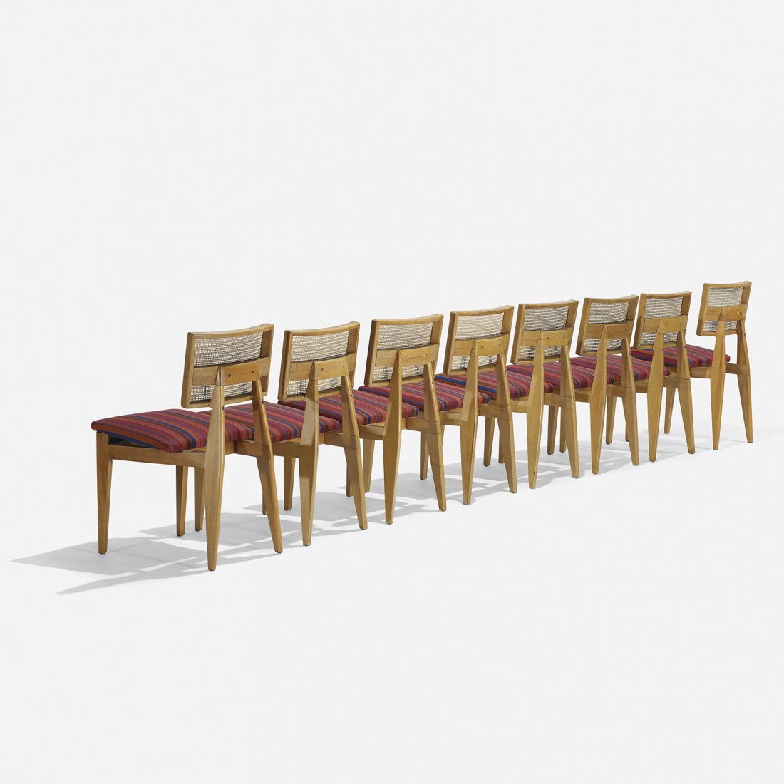 George Nelson & Associates dining chairs, set of eight: George Nelson & Associates dining chairs model 4669, set of eight Herman Miller USA, 1946 birch, caning, Alexander Girard upholstery 17.25 w x 19 d x 31 h inches These chairs feature Alexander Girard'