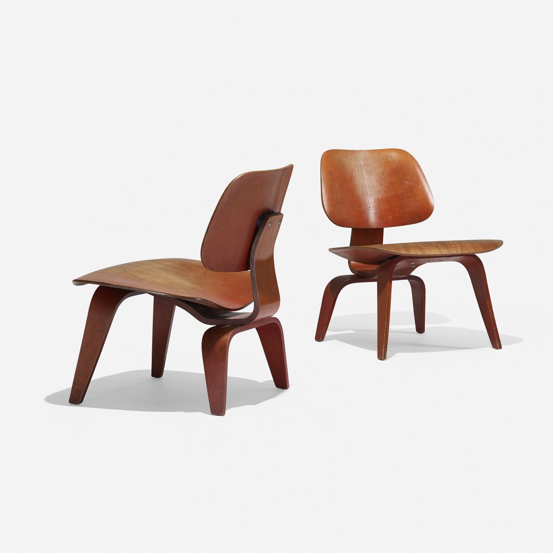 Charles and Ray Eames LCWs, pair: Charles and Ray Eames LCWs, pair Herman Miller USA, 1945 aniline-dyed ash plywood, rubber 22 w x 24 d x 27 h inches Literature: Eames Design: The Work of the Office of Charles and Ray Eames, Neuhart, 