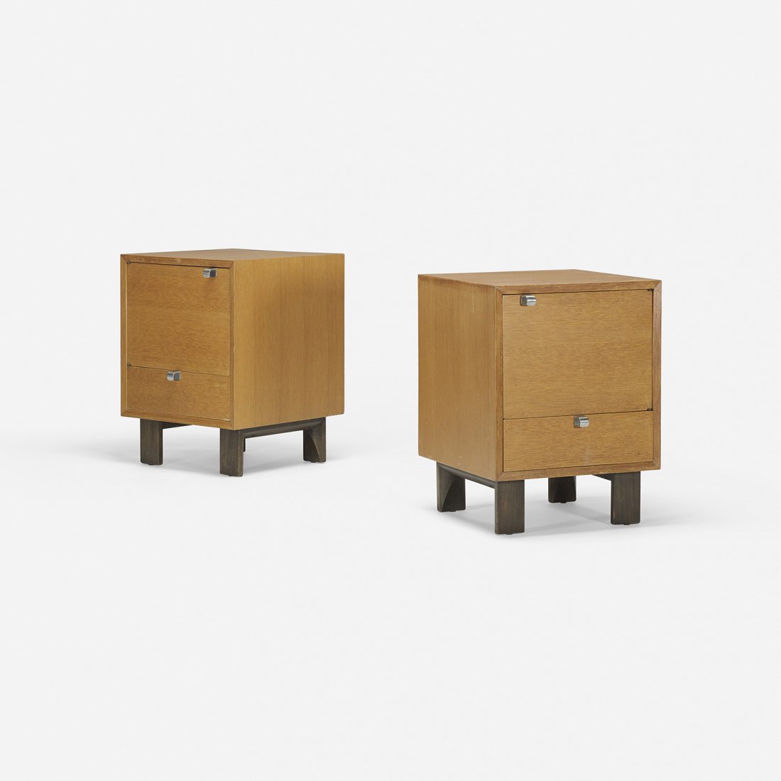 George Nelson & Associates nightstands model 4617, pair: George Nelson & Associates nightstands model 4617, pair Herman Miller USA, 1946 combed oak, lacquered wood, aluminum 18 w x 19.5 d x 24.25 h inches Each nightstand features one door and one drawer. Li