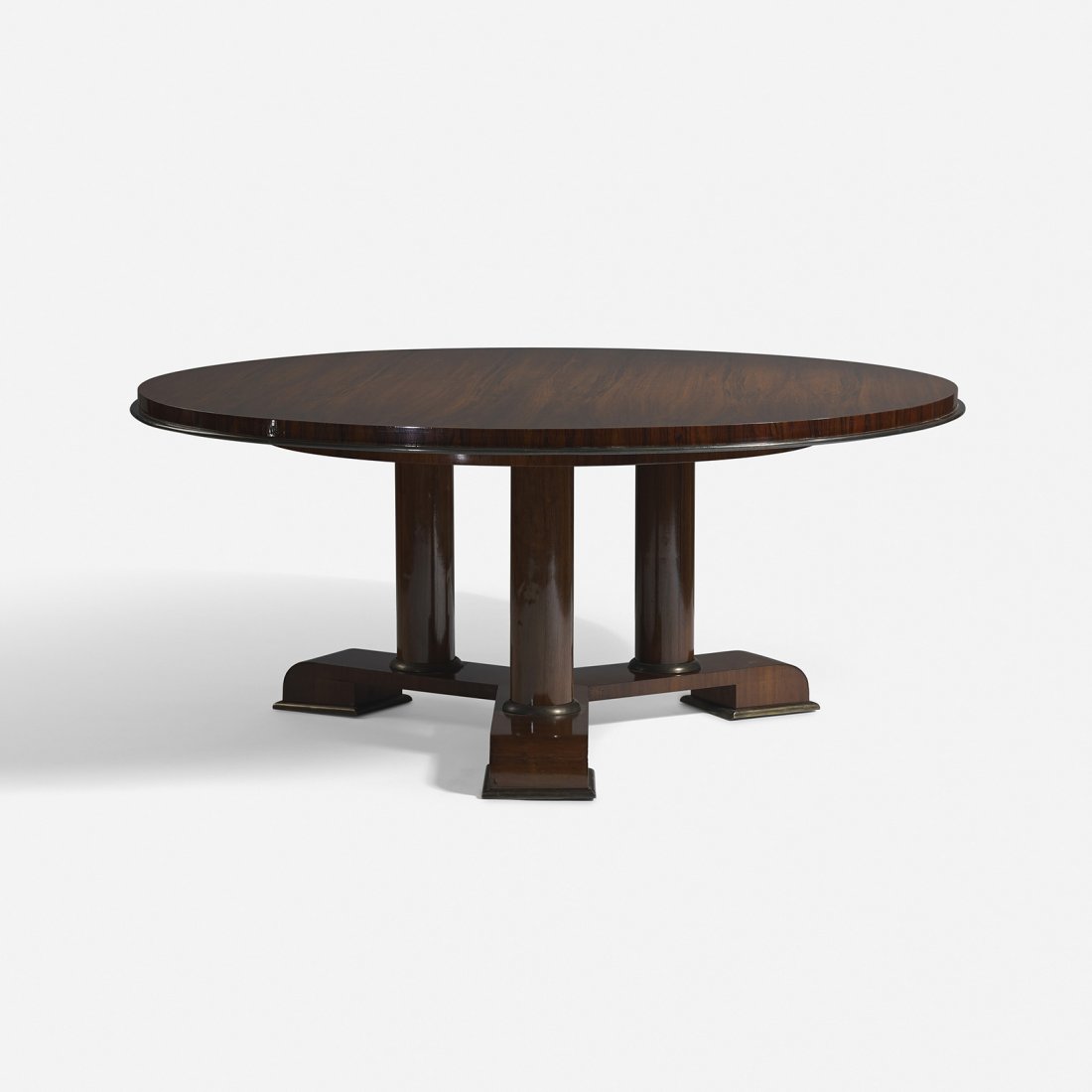 Jean Royere dining table: Jean Royère dining table France, c. 1955 rosewood, brass 67.5 dia x 27.75 h inches This work is documented in the Royère archives. Provenance: Private collection, Lima, Peru | Galerie Jacques Lacost
