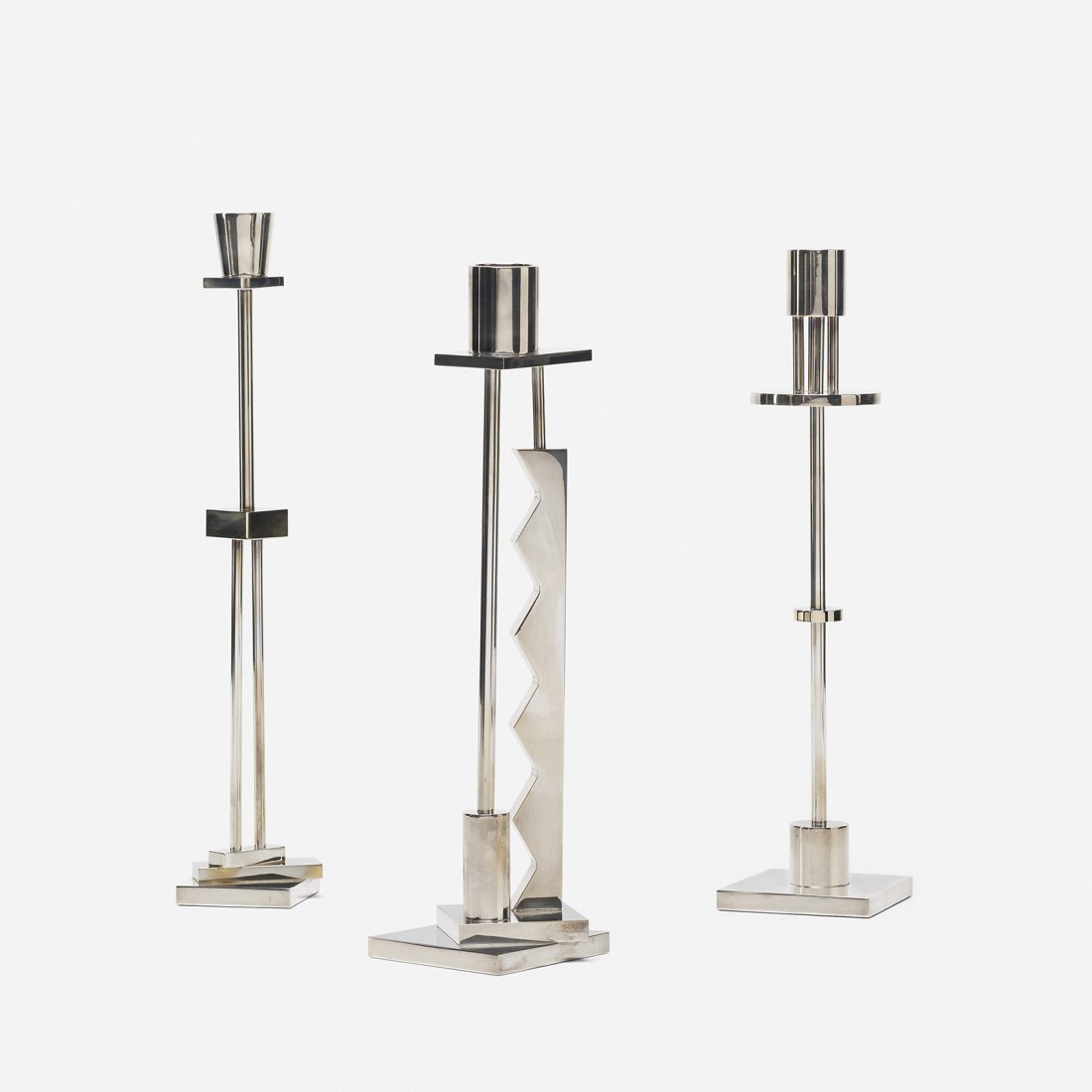 Ettore Sottsass candlesticks, set of three: Ettore Sottsass candlesticks, set of three Swid Powell Italy, c. 1985 silver-plate 3.5 w x 3.25 d x 12 h inches Signed with impressed manufacturer's mark to each example: [Swid Powell Silver Plate Mad