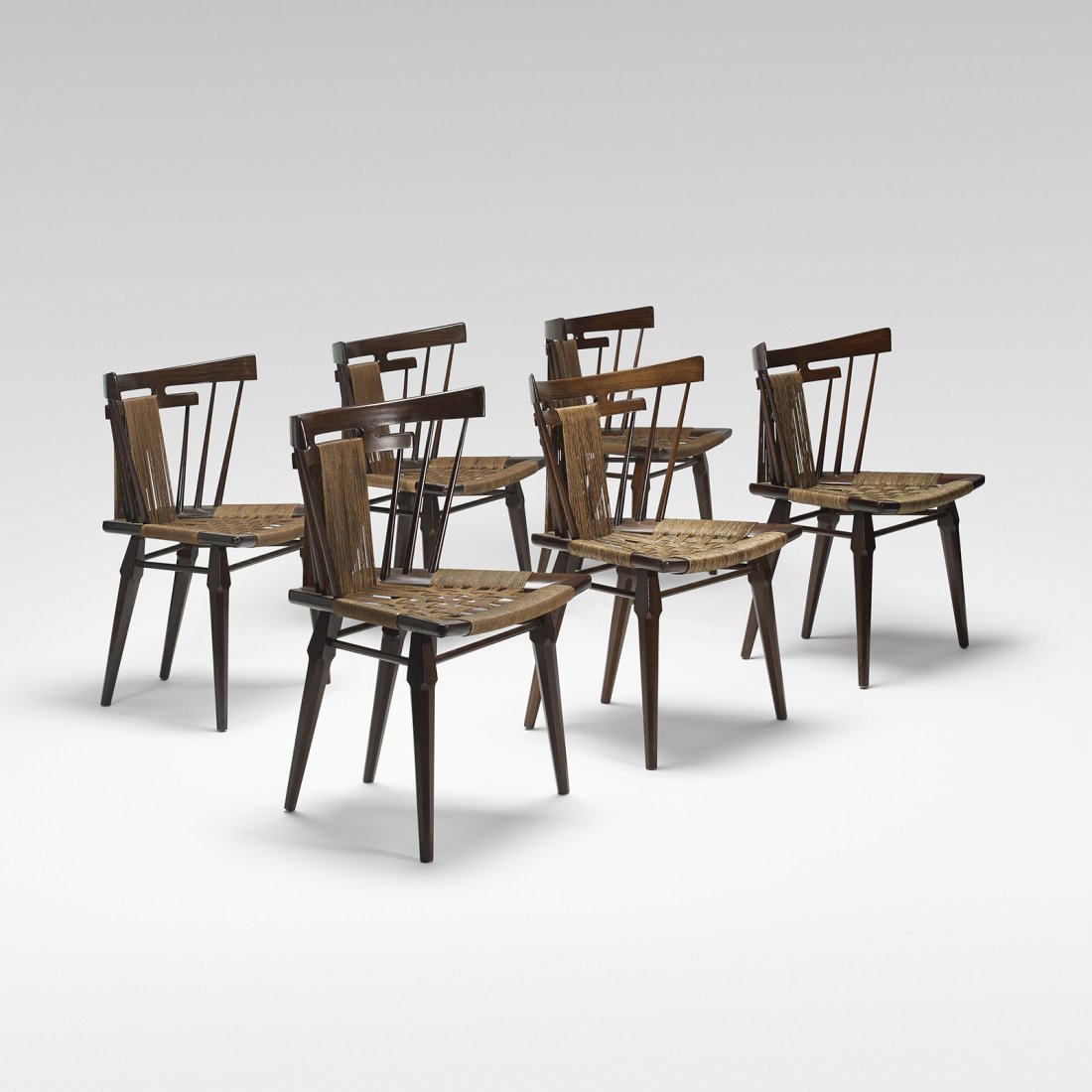 Edmund Spence dining chairs, set of six: Edmund Spence dining chairs, set of six Mueblera S.A. Mexico, c. 1955 walnut, rush 24 w x 19 d x 31 h inches