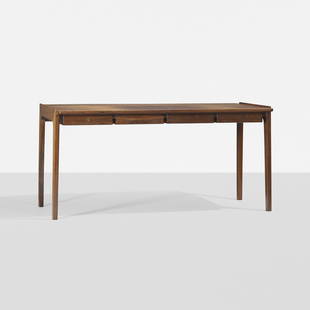 Tove and Edvard Kindt-Larsen rare desk: Tove and Edvard Kindt-Larsen rare desk Thorald Madsen Snedkeri Denmark, c. 1960 rosewood, brass 60 w x 29 d x 29 h inches Desk features four drawers. Signed with applied brass manufacturer's label to